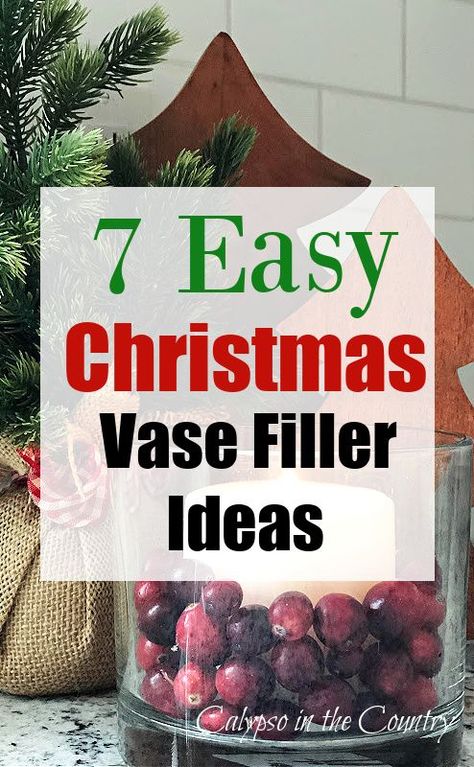 Keep your Christmas decorating simple this year with some easy DIY Christmas decor. Work on one vignette at a time. Fill some vases or glass containers with items from the grocery store or from your Christmas decoration collection. Christmas vase filler ideas include, candles, cranberries, nuts, pine cones, Christmas ornaments and more! See all the creative vase filler ideas on the blog! Vase Inside A Vase, Christmas Decor Ideas Glass Vase, Christmas Table Centerpieces Ideas Vases, Clear Jar Christmas Decor, Christmas Flower Vase Ideas, Glass Candle Holders Decorating Ideas Christmas, Small Vase Christmas Decor, Christmas Bulbs In Vase, Tall Vase Decorating Ideas For Christmas