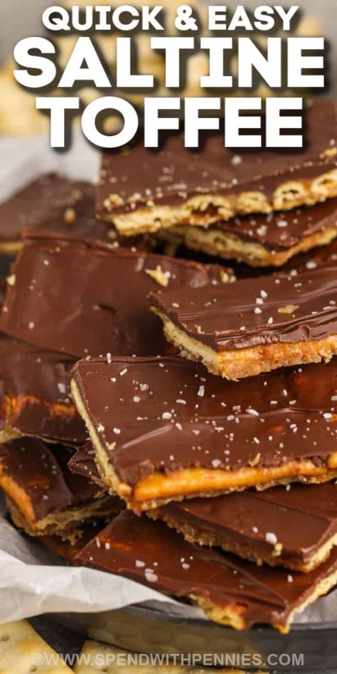 Saltine Toffee (also known as Christmas Crack) is a budget-friendly dessert that everyone loves. Saltine crackers are drizzled with a brown sugar & butter mixture, then layered with chocolate and sprinkled with sea salt. Whether they are made for the family, the office, or for school, this Christmas Crack will be everyone's new holiday favorite! #saltinetoffee #christmascrack #dessert #spendwithpennies Cracker Chocolate Bark Saltine Toffee, Toffee Bars Recipe Saltines, Crackers With Chocolate Saltine, Desserts Using Saltine Crackers, Chocolate Saltine Bark, Caramel Saltine Crackers, Toffee Saltines, Saltine Chocolate Bark, Sweets Made With Saltine Crackers