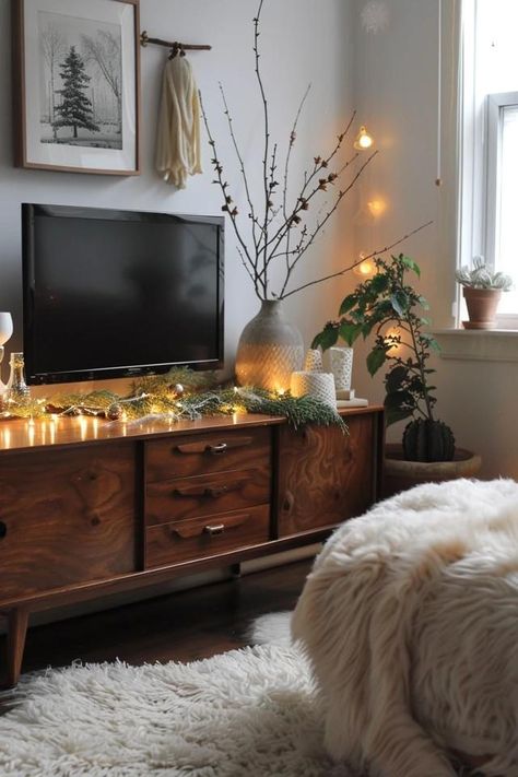 Winter TV Stands: Functional Decor Christmas Tv Console Decor, Christmas Decor Tv Stand, Tv Stand Christmas Decor Ideas, Fall Tv Stand Decor, Tv Stand Christmas Decor, Room Candles, Living Room Makeovers, Tv Console Decor, Tv Stand Decor Ideas