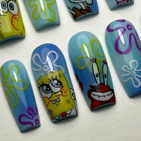 still shots of the spongebob sets for @kristy.sarah & @hermusicofficial 🍍🌴🦀🥥 all hand painted with love @haenails code HOTGURL10 - @mpa_onlinestore palette @functionofvex code HOTGURL - Aura Melt Palettes @esvynails code HOTGURL10 - Black & White gel paints #spongebob #spongebobnails #characternails #pressonnails #pressonnailslovers #pressons #thepressoncollective #squarenails #handpaintednailart #nailsnailsnails #nailsofinstagram Spongebob Short Nails, Bobs Burgers Nail Art, Spongebob Themed Nails, Nail Spongebob, Spongebob Nails Acrylic, Spongebob Nails Designs, Nails Spongebob, Sponge Bob Nails, Cartoon Character Nail Art