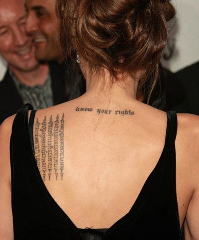 Angelina Jolie’s Tattoos And Their Meanings Tattoo Writing Designs, Angelina Jolie Back Tattoo, Angelina Jolie Tattoo, Writing Tattoos, Text Tattoo, Original Tattoos, Tattoo Font, Celebrity Tattoos, Cross Tattoo