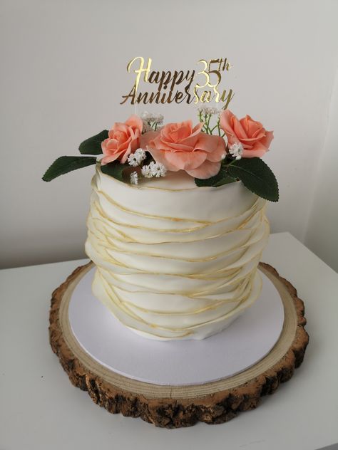 Coral roses. Fondant ruffles. Gold. Anniversary cake. Coral Wedding Anniversary Ideas, 35th Anniversary Cake, Coral Anniversary Party, 35th Wedding Anniversary Party Ideas, 35th Anniversary Party Ideas, 35th Wedding Anniversary Cake, 35 Wedding Anniversary, 35th Anniversary Ideas, Coral Anniversary