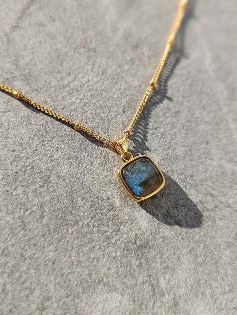 The design features a natural Labradorite gemstone set in an 18k gold plated pendant on a dainty bobble / ball chain. The LABRADORITE is a stone of overall good luck. It aids in concentration, clarity, courage, understanding one's life purpose and getting rid of negative energy and attachments. 💍 GENUINE LABRADORITE NECKLACE  💍 18K GOLD PLATED CHAIN  💍 DELIVERED IN A JEWELLERY GIFT BAG 💍 FREE UK DELIVERY  Great for every day wear. Makes for a great personalised gift for any occasion. It is a Labradorite Necklace Pendants, Getting Rid Of Negative Energy, Rid Of Negative Energy, Gemstone Pendant Necklace, Labradorite Necklace, Dope Jewelry, Labradorite Jewelry, Labradorite Necklaces, Necklace Crystal