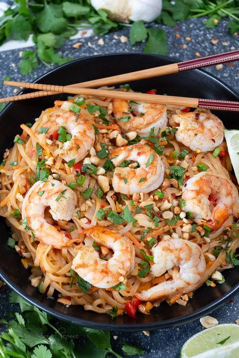 Spicy Shrimp Pad Thai Recipe with Peanut Butter Sauce | ©GarrisonStreetEats | Spicy | Shrimp | Pad Thai | Recipe | Peanut Butter Sauce | Homemade | Easy | Seafood | Homemade Sauce | Pad Thai Noodles | Rice Noodle Recipes | Thai Food recipes | Asian | Entrees | Weeknight Dinner | Dinner Recipes | Pad Thai Sauce | Shrimp Pad Thai | Best | Peanut Sauce | Noodle | Sauce | Peanut Butter | Easy Dinner Ideas | Healthy | Spicy Peanut Noodles | Sriracha | Spicy Thai Noodles | Spicy Peanut Butter Noodles Pad Thai Recipe Peanut Butter, Shrimp Peanut Sauce, Pad Thai Peanut Sauce, Shrimp Pad Thai Recipe, Easy Thai Peanut Sauce, Asian Entrees, Recipe With Peanut Butter, Peanut Butter Noodles, Noodle Sauce