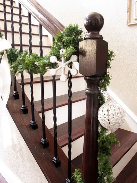 wrought iron spindles, dark stain and white trim Barndominium Stairs, Wrought Iron Stair Spindles, Iron Stair Spindles, Banister Remodel, Wrought Iron Spindles, Iron Stairs, Hall Stairs, Iron Spindles, Wrought Iron Stair Railing