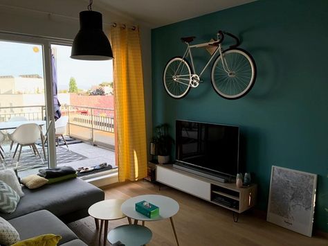 Pierre mounted his Burnside Bike Rack over his television.  Wheres yours hanging out?  #bikerack Minimalist Bike, Bike Storage Apartment, Bike Display, Wall Mount Bike Rack, Bike Rack Wall, Bike Shelf, Bike Wall Mount, Bike Hanger, Wood Bike