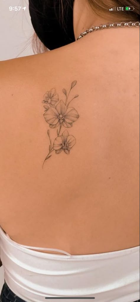 Back Orchid Tattoo, Orchid Flower Tattoos Fine Line, Orchid Tattoo Cattleya, Orkid Flower Tattoo Design, Orchid Tattoo Back For Women, Orchid Back Tattoo Women, Orchid Tattoo Wrist, Orchid Rose Tattoo, Orchid Tattoo Ankle