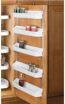 Simplify Your Organization: Hold your spices in places on a shelf mounted on the inside of your cabinet door. Good for RVs or your kitchen. - rugged life Rangement Caravaning, Pantry Lazy Susan, Rv Living Organization, Camper Organization, Rv Organization, Camper Storage, Rev A Shelf, Camping Stuff, Rv Storage