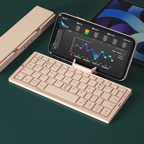 🌟 Introducing the Mini Folding Bluetooth Keyboard! 🌟 Take your productivity on the go with our compact, foldable keyboard. It's perfect for phones and tablets, and it connects via Bluetooth to up to 3 devices simultaneously. Plus, it comes with a handy stand for convenience! 🔹 Compact and portable 🔹 Supports 3 devices 🔹 Rechargeable and long-lasting 🔹 Perfect for work and travel Get yours now at Smile E Store and transform the way you work on your mobile devices! 📱💻 #portableproductivity #... Bluetooth Keyboard, Bluetooth Device, Electrical Outlets, Operating System, Aruba, Tablet Laptop, Tech Gadgets, Costa Rica, Keyboard