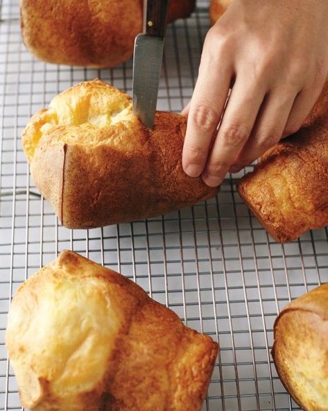 Popovers lose their crunch if they linger in the pan, so turn them out on a wire rack immediately and poke a small opening in the side of each with a paring knife to let the steam escape. Serve right away. Try all of our popover variations: Gruyere-Thyme Popovers, Dark Chocolate Popovers, Chive Popovers, Cinnamon Sugar Popovers, Bacon and Black Pepper Popovers, and Orange Popovers. Perfect Popovers, Popovers Recipe, Muffin Pan Recipes, Mac And Cheese Cups, Popover Recipe, Popover Pan, Bite Size Appetizers, Muffin Tin Recipes, Holiday Brunch