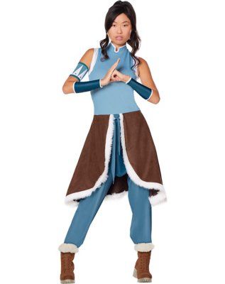 Embrace your strength and power in this officially licensed Avatar: The Legend of Korra costume! Korra strives for balance in all things. This Korra costume features a sleeveless blue jumpsuit with an attached skirt. Korra's signature arm cuffs create an authentic and instantly recognizable look! Officially licensed Includes: Jumpsuit with attached skirt 1 Upper arm cuff 2 Lower arm cuffs Mockneck Sleeveless Zipper closure Material: Polyester Care: Hand wash Imported Note: Shoes and hair accesso Korra Costume, Upper Arm Cuffs, Avatar Korra, The Avatar, The Legend Of Korra, Faux Suede Skirt, Blue Jumpsuits, Suede Skirt, Dressing Up