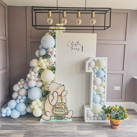 C h e s t e r T u r n s O n e | 🍯 Chester is celebrating turning one today surrounded by family for a party at home. So we created a… | Instagram Decoration Ideas Party 1 Year, Winnie The Pooh First Birthday Backdrop, Winnie The Pooh Backdrop 1st Birthdays, Winnie The Pooh Birthday Backdrop, Compleanno Winnie The Pooh, Winnie The Pooh Birthday Party Ideas, 1st Birthday Table Decorations, First Birthday Boy Decorations Ideas, Bee Birthday Theme