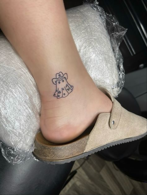 Ghost With Boots Tattoo, Cute Small Nashville Tattoos, Ghost Tattoos Cowboy Hat, Animal In Cowboy Hat Tattoo, Ghost With Sunglasses Tattoo, Mini Ghost Tattoo Matching, Western Ghost Tattoo, Cowboy Inspired Tattoo, Cow Ghost Tattoo