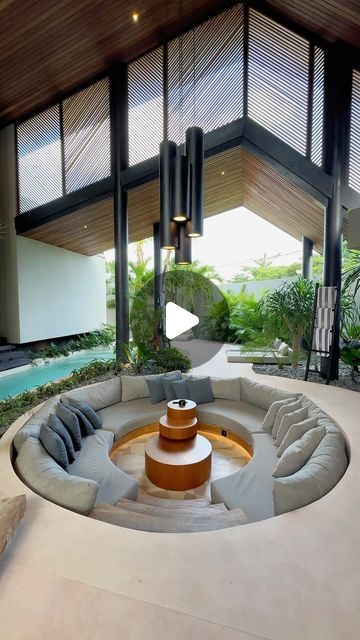 BALI ARCHITECT & CONSTRUCTION on Instagram: "This house blends adventure and relaxation in one magnificent place!

This luxurious tropical home features a stunning wooden architectural design that blends effortlessly with the lush greenery. The crystal blue waters of the pool beckon you to take a refreshing dip. A perfect spot to relax, recharge and indulge in the beauty of nature. Let your senses come alive in this little slice of paradise.

📍Location: Villa Feh by @houseofwindsbali
Designed by @biombo_architects

If you are interested in building your dream villa in Bali, contact @balitecture for all your architecture and construction needs." Tropical Residence, Villa In Bali, Dream Villa, House Blend, Tropical Houses, Crystal Blue, Lush Greenery, Architectural Design, Custom Homes