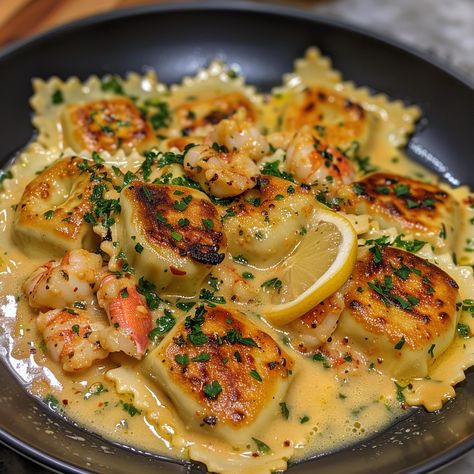 🦞 Savor the elegance of Lobster Ravioli in a Zesty Lemon Butter Sauce! #SeafoodLovers #GourmetEats Lobster Ravioli in a Zesty Lemon Butter Sauce Ingredients: Lobster ravioli (1 pack, store-bought or homemade) Butter (1/2 cup) Lemon juice (1/4 cup) Garlic (2 cloves, minced) Lemon zest (1 tsp) Fresh parsley (1/4 cup, chopped) Salt and pepper (to taste) Instructions: Cook ravioli according to package instructions, drain and set aside. In a pan, melt butter over medium heat, add garlic and sa... Lobster Tagliatelle, Lobster Ravioli, Party Hosting, Instagram Recipes, Ravioli Recipe, Twisted Recipes, Lemon Butter Sauce, Food Babe, Homemade Butter