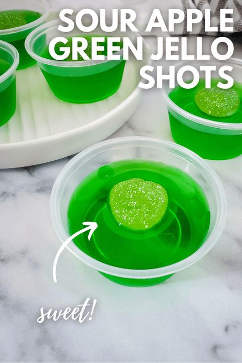 Sour Apple Green Jello Shots are a fun and vibrant way to liven up your party! These boozy treats offer a perfect combination of sweet, tangy, and sour flavors that will leave your taste buds craving more. Green Jello Shots, Lime Jello Shots, Easy Jello Shots, Apple Shots, Sour Apple Pucker, Jello Shots Vodka, Midori Sour, Halloween Jello Shots, Boozy Treats