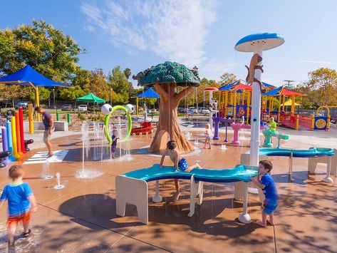 Designed for children of all abilities, the Eagle Soar Splash Pad offers an inclusive and welcoming place where children with special needs can play, explore and socialize. Combining a zero-depth splash pad with fun elements, and interactive stations with kinesthetic play prompts, the splash pad offers an exceptional play experience for the residents of Temecula. … Continue reading Eagle Soar Splash Pad: Margarita Park Water Park Ideas, Spray Park, Splash Zone, Water Playground, Splash Park, Kids Indoor Playground, Play Ground, Play Pool, Main Street Usa