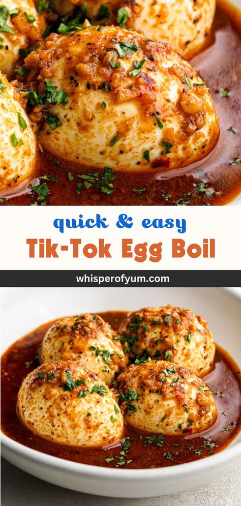 bowl of hard-boiled eggs in a spicy boil sauce topped with parsley