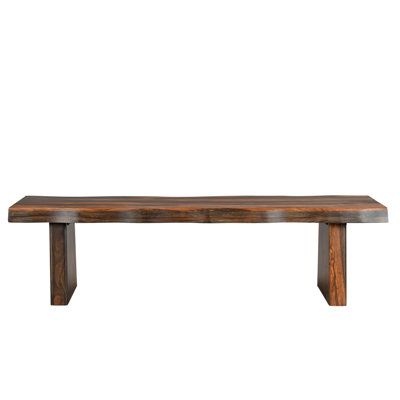 Experience the perfect blend of modern elegance and natural charm with this dining bench, meticulously handcrafted from solid sheesham wood. Its rich finish adds warmth to any dining space, while the live edge wood movement and unique grain variation infuse your home with organic beauty. Taran Designs Color/Pattern: Dark Brown, Size: 18" H x 68" W x 18" D | Taran Designs Larae Live Edge Wood Leg Dining Bench 18.0 H x 68.0 W x 18.0 D in brownWood | 18" H x 68" W x 18" D | Wayfair Solid Wood Dining Set, Sheesham Wood, Matching Chairs, Live Edge Wood, Live Edge Table, Live Edge, Dining Experiences, Dining Set, Wood Legs