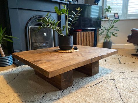 "This beautiful Floating Coffee Table is absolutely perfect for your modern forward thinking home. Its gorgeous artisan floating style and galleon oak finish (among other finishes) creates an ambiance like no other.  The floating coffee table in the main pictures is our Galleon Oak\" wax finish with an enhanced distressed appearance which makes it a stand out statement piece - this finish is exclusive to Brockley Bespoke!  Style: Japandi / Rustic / Scandi The floating rustic coffee table pictured is 80cm depth by 100cm wide. The height is 30cm. Please see drop down for other dimensions options. Also very happy to take custom order (just pop us a message). EXCITING NEWS & ACCOLADES We're honoured to be exhibiting with Kinder Design in Croydon in October for the Eco House show. (Coffee Table Natural Wood Coffee Table Rustic, Natural Wood Coffee Tables, Cool Wood Coffee Table, Coffee Table Adjustable Height, 4x4 Coffee Table, Diy Living Room Coffee Table, Low Coffee Table Living Room, Modern Rustic Interior Design Living Room, Homemade Coffee Table