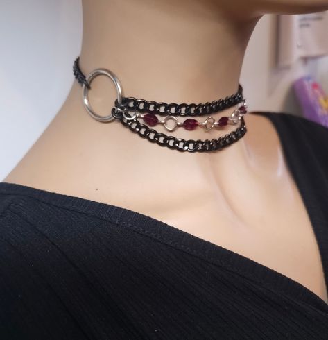 This black steel handmade gothic collar choker is a gorgeous chunky stainless steel chain layered necklace set with beaded Austrian Crystal beads hand wound on stained steel.  It has a built-in extender so it runs from 12" to 16".  The chain is made of sturdy stainless steel, ensuring its durability and longevity, it is hypoallergenic, waterproof, sweatproof, will never tarnish or fade or change the color of your skin.  This necklace set is an excellent handmade gift for someone special. It is a Emo Metal Choker For Festivals, Emo Style Metal Choker For Festivals, Punk Metal Choker For Alternative Fashion, Emo Style Festival Jewelry With Chain, Metal Emo Choker For Alternative Fashion, Festival Chain Choker Jewelry, Black Metal Choker For Alternative Fashion, Festival Choker Chain Jewelry, Alternative Style Black Metal Jewelry