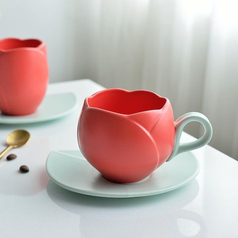 PRICES MAY VARY. Unique Design: The Taza De Tulipan, or Tulip Mug, features a distinctive tulip flower-shaped design that adds creativity and charm to your coffee or tea moments. This ceramic flower cup stands out with its eye-catching and unique appearance. Chic Floral Set: Taza De Tulipan, a tulip-shaped mug, pairs seamlessly with a leaf-shaped coaster for a complete and stylish cup-and-saucer ensemble. This set not only shields your tabletop but also brings a touch of nature to your space, ef Master Suite Decor, Modern Master Suite, Flower Cup, Tassen Design, How To Make Paper Flowers, Enjoy Coffee, Red Tulips, Mug Set, Ceramic Flowers