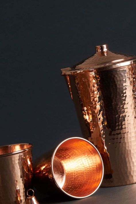 Combining modern science and the ancient Ayurvedic practice and understanding of the health benefits of drinking from copper vessels, cups, pitcher and Sertodo Copper's Ayurveda Set, you can easily enjoy your daily ritual of heirloom quality copper goods with us. Shop here for elegant and heavy gauge Ayurvedic practice hammered copper goods. #ayurvedacoppergoods #ayurvediccopperlifestyle #handmadecoppergoods Storing Water, Copper Accessories, Copper Vessel, Copper Cups, Copper Gifts, Copper Bar, Drinkware Sets, Copper Mugs, Copper Bowl