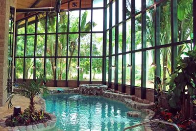 10 Coolest Airbnbs With Indoor Pools Indoor Residential Swimming Pool, Indoor Pool Ideas Dream Homes, Indoor Pools In Houses, Indoor Pool Ideas, Small Indoor Pool, Lazy River Pool, Indoor Pool House, Elegant Entrance, Lake Theme