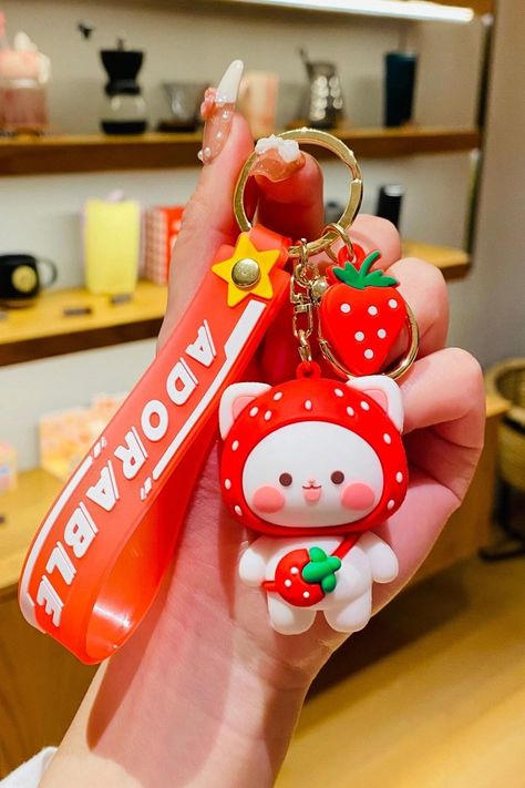 These keychains are well made. This is an adorable keychain. These are super cute and of great quality. #women #girls #cute #keychain Adorable Keychains, Cat Strawberry, Fruit Cat, Barang Aesthetic, Key Decorations, Diy Crochet Bag, Strawberry Charm, Small Dolls, Person Cartoon