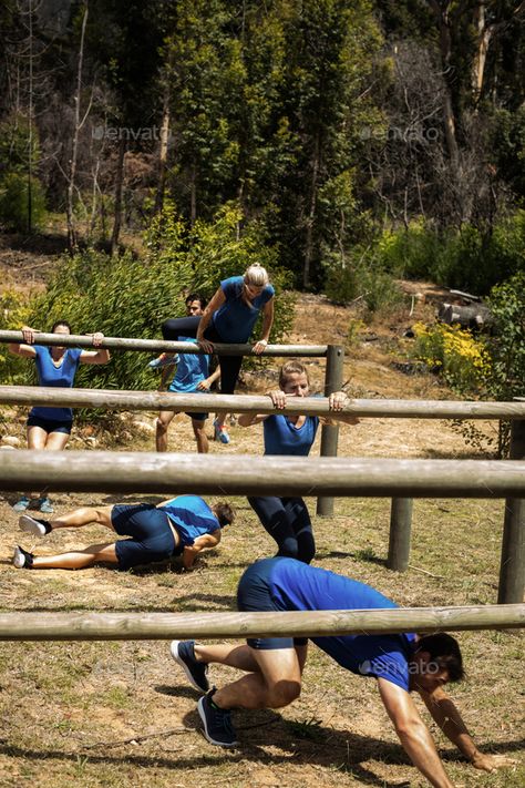 People passing through hurdles during obstacle course by Wavebreakmedia. People passing through hurdles during obstacle course in boot camp #Sponsored #hurdles, #passing, #People, #obstacle Obstacle Course Aesthetic, Obstacle Course Training, Backyard Obstacle Course, Team Dynamics, Fun Exercises, Hospital Architecture, Creativity Exercises, Building Activities, Brand Ideas