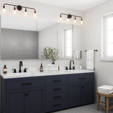 The Prospect Vanity Light Collection references a familiar silhouette with its traditional structure and a modern, updated finish in dramatic matte black. Versatile and distinct, this contemporary fixture makes a strong statement on style, perfect for a modern bathroom or vanity. Despite its minimal style, the profile of this 4-light vanity has a natural symmetry along with its gently arched arms. The simplicity of this fixture is ideal for showcasing dramatic, vintage style bulbs for an industr Mate Black Bathroom Fixtures, Black Accent In Bathroom, Bathroom Vanity Next To Wall, Bathroom With Dark Fixtures, Black Bathroom Features, Bathroom Black Finishes, Full Bathroom Remodel Modern, Small Master Bath Remodel Modern, Black And White Home Interior Bathroom