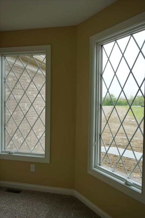 Windows with diamond grid pattern to The Hanover, a custom two-story home built by Wieland Builders.www.wielandbuilders.com Windows With Diamond Grids, Diamond Window Grid, Diamond Grid Windows, Diamond Windows, Home Window Design, Fancy Window, Great Room Addition, Steel Grill Design, Shelves Decoration