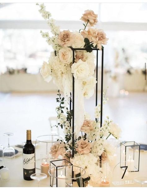 Monochromatic Wedding Centerpieces, Modern Tall Centerpieces Wedding, Gold Harlow Stand Centerpiece, Champagne Welcome Table Wedding, Elevated Floral Arrangements, High Centerpiece Wedding Romantic, Rectangle Wedding Centerpieces, Neutral Wedding Flowers Centerpieces, Gala Centrepiece