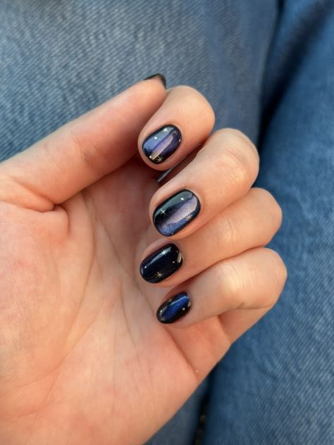 maybe one of my favorite nail sets everrrrr. i'm obsessed!! the cateye chrome shifts in the light 🤩 spooky nails. night sky nails. blue cat eye nails. gelx manicures. gelx nails. gelx nail art. salon manicure. nail ideas. nail designs. nail art. nail art designs. nails 2024. nails 2025. nail colors. nail inspiration. witchy nail inspo. nail inspo halloween. halloween nail inspiration. short round nails. natural nails. natural nail growth. 2024 nails. 2024 nail trends. structured manicure. Short Structured Manicure, Round Nails Natural, Nails Night Sky, Witchy Nails Short, Blue Cat Eye Nails, Night Sky Nails, Nails Cateye, Natural Nail Growth, Structured Manicure