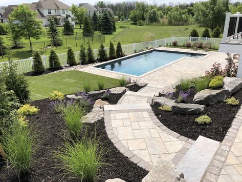 Stone paver patio, pool surround, walkway and planting by Josh Landscape Co. Walkway To Pool From Patio, Pools With Pavers Around, Paver Patio Around Pool, Pool Walkway Pathways, Pool Pavers Ideas, Walkway To Pool, Pool Surround Ideas, Pavers Around Pool, Stone Paver Patio