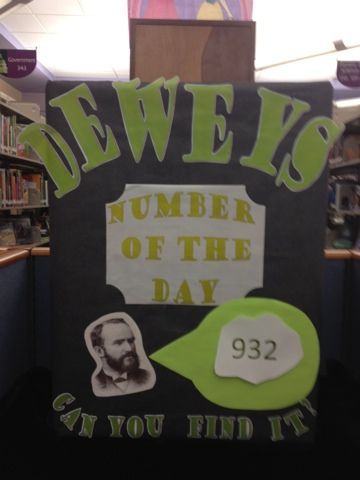 Fun way to introduce kids to finding books in the library! Dewey Decimal Bulletin Boards, Library Contests, Passive Programming Library, School Library Lessons, Library Classroom, Number Of The Day, Passive Programs, Library Lesson Plans, Dewey Decimal