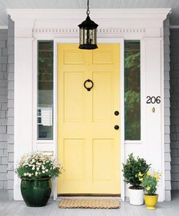 Like the yellow door for a light gray house.  Hmmmm, I have a lite gray house... and my favorite color is yellow... Hmmm  I wonder if this would be too much though.  It looks light and fresh here, I wonder if during the winter it would look just as good though.  I have shutters that I would paint to match as well as garage doors too. Hawthorne Yellow, Yellow Front Door, Front Door Inspiration, Yellow Front Doors, Front Door Paint Colors, Yellow Door, Door Paint Colors, Young House Love, Real Estat