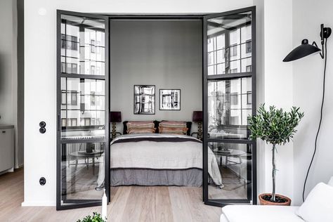 A Small Stockholm Loft with a Cool, Contemporary Vibe - Nordic Design Bedroom Ideas Attic, Bedroom Scandinavian Style, French Doors Bedroom, Scandinavian Design Bedroom, Scandinavian Bedroom, Scandinavian Interior Design, Black And White Decor, Trendy Bedroom, Minimalism Interior