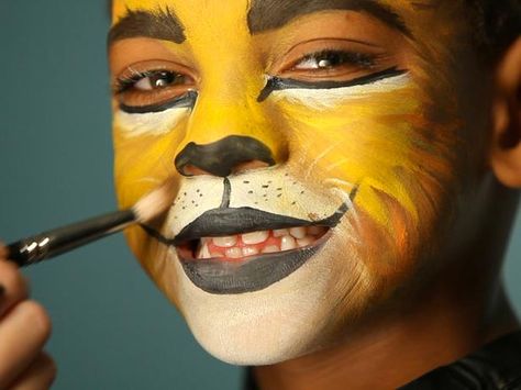 Kid's Halloween Makeup Tutorial: Lion - on HGTV Cat Costume Makeup, Lion Face Paint, Lion Halloween, Cats Face, Cat Eye Makeup, Halloween Makeup Tutorial, Face Painting Designs, Kids Makeup, Makeup Tutorial For Beginners