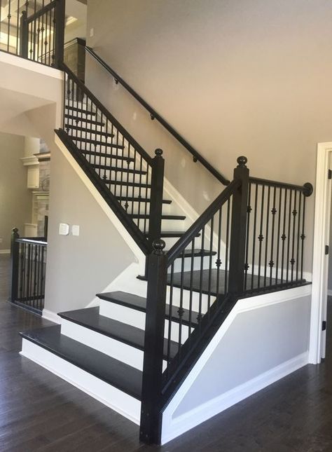 Banister Spindles Ideas, Espresso Stained Stairs, Wrought Iron Spindles On Stairs, Black And White Staircase, Wrought Iron Stair Spindles, Wrought Iron Spindles, Stair Railing Makeover, Iron Spindles, Stair Renovation