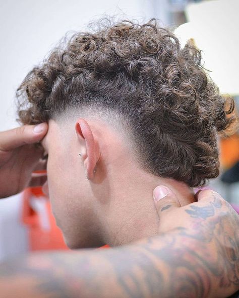 Faded Mullet Men Curly, Mullet Fade Haircut Curly, Burst Fade With Curly Hair, Fohawk Haircut Fade Curly, Mohawk Curly Hair Men, Curly Burst Fade Mullet, Burst Fade Haircut Curly, Curly Mohawk Men, Frohawk Fade Men