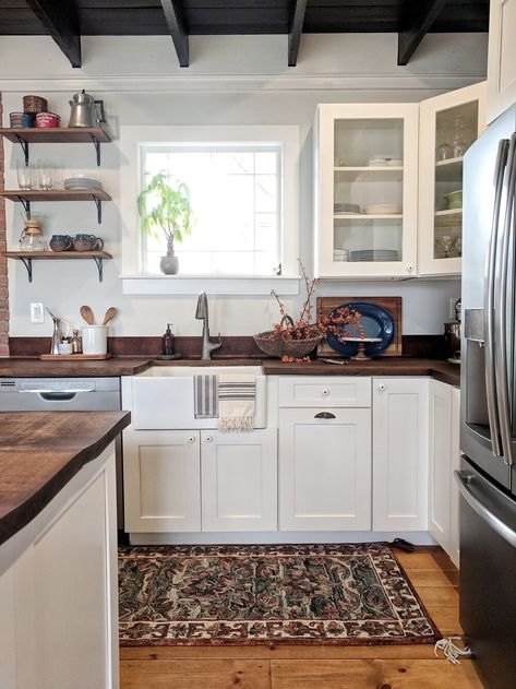 Rustic Kitchen With White Cabinets, Dark Wood White Kitchen, White And Dark Oak Kitchen, Dark Oak And White Kitchen, Dark Oak Countertop Kitchen, Dark Counter Tops Kitchen, Farmhouse Kitchen Sink Butcher Block Counter, Dark Appliances Kitchen, Dark Brown Countertops Kitchen