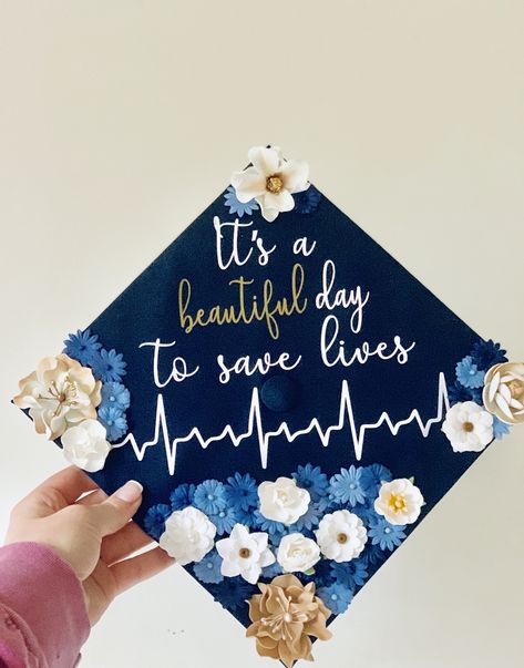 graduation cap, nursing school, it’s a beautiful day to save lives Nurse Graduation Cap Ideas, Graduation Cap Nursing, Bsn Graduation Cap, Nurse Graduation Cap Designs, Graduation Cap Decoration Nursing, Teacher Graduation Cap, Creative Graduation Caps, Nursing School Graduation Party, Graduation Cap Ideas