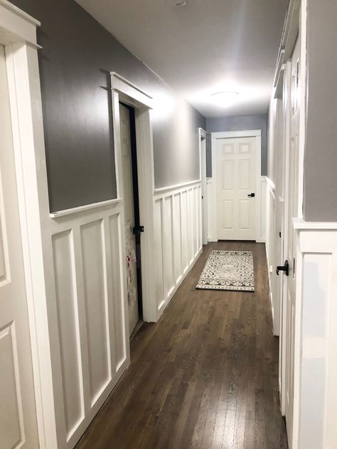 Waynescotting Ideas Hallways, Hallway With Board And Batten, Dark Narrow Hallway Ideas Wall Colors, Long Basement Hallway Ideas, Wainscoting In Hallway, Hallway Wall Paneling Ideas, Accent Walls Hallway, Board And Batten In Hallway, Hallway Wall Design Ideas