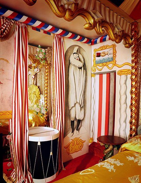 A wall detail from the bedroom re-creation, including a military drum used as a table, curated by www.beaudesert.co.uk and www.cecilbeatonfabrics.com Circus Bathroom, Circus Themed Bedroom, Circus Bedroom, Vintage Circus Nursery, Circus Room, Circus Nursery, Wall Detail, Circus Decorations, Cecil Beaton