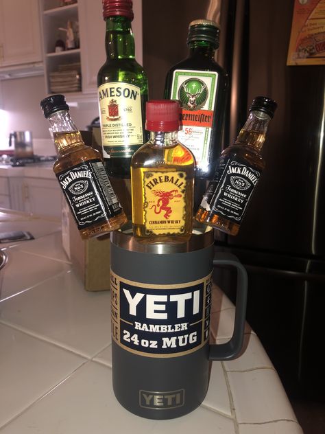 Stick his favorite whiskey in there and he’ll be good to go! Buck And Doe Prizes, Yeti Gift Ideas, Yeti Cup Gift Basket Ideas, Raffle Baskets For Men, Yeti Gift Basket Ideas, Yeti Gift Basket, Booze Gift Basket, 21st Birthday Gifts For Boyfriend, Beer Gift Ideas