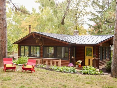 Updated Cabin on a Lake in Minnesota Updated Cabin, Cabin On A Lake, Giant Moose, Fall Curb Appeal, Porch Appeal, Dark And Creepy, Bright Front Doors, Black Metal Roof, Fall Bonfire