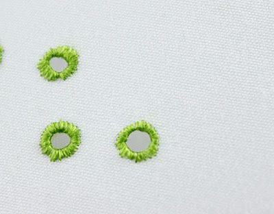 eyelet hole stitch Updated! Simple Hole Sewing, How To Add Eyelets To Fabric, How To Sew Eyelets, Hand Sewn Eyelet Holes, Buttonhole Wheel Stitch Embroidery, Embroidery Needles, Sewing Hacks, Hand Stitching, Machine Embroidery Designs