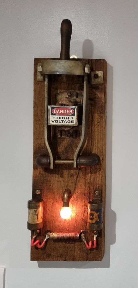 Handmade switch on would board with light bulb that lights when handle is lifted up Steampunk Light Switch, Frankenstein Lab, Frankenstein Light Switch, Industrial Lamp Design, Rustic Wall Decor Diy, Mad Scientist Halloween, Lab Scientist, Fallout Props, Steampunk Light