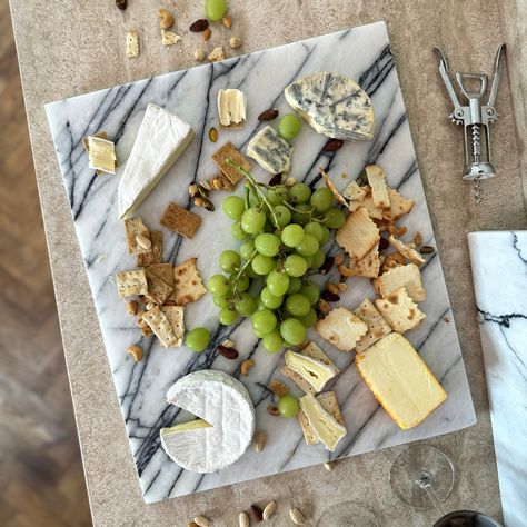 How much do you like cheese?! 🧀 With our BRAND NEW range of Bold White Marble boards there is a size for every cheese lover. Whether you like to keep it simple or like to go all the way, we have the perfect luxury platter in stock. Go to stonedamsterdam.com to DISCOVER them all! 💫 And since we like to make things MARBLEOUS... Did you know that the 3 largest boards also fit the most popular night stands of IKEA? 💪🏼 - Board 'Kevin' fits the Kullen night stand - Board 'Victor' fits the Vikha... Marble Board, Kitchen Counter Top, Cheese Platter, Ikea Malm, Cheese Lover, Cheese Platters, Night Stand, Counter Top, Keep It Simple